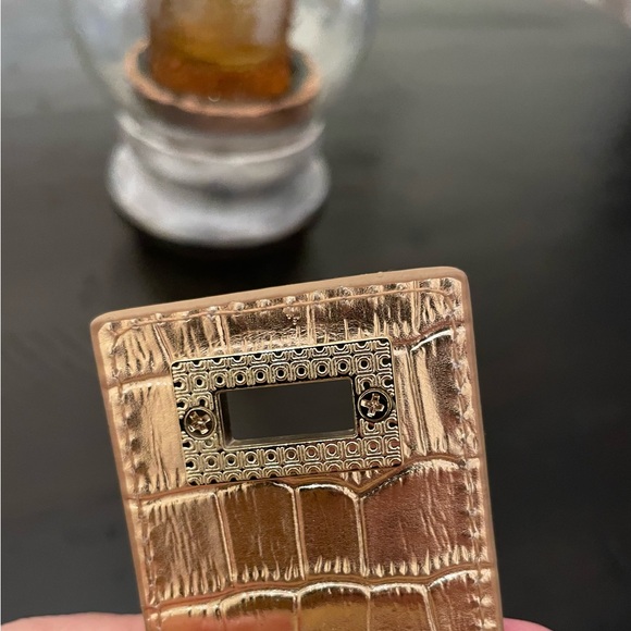 Ann Taylor straw woven clutch with gold accents. Fold over toggle closure. - Picture 10 of 12